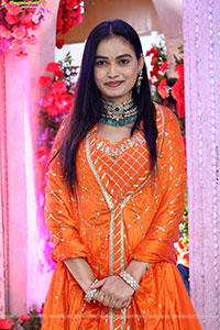 Manu Malleshwari stills in Orange Colour Designer Dress