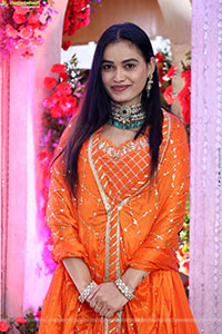 Manu Malleshwari stills in Orange Colour Designer Dress