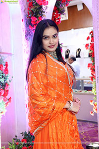 Manu Malleshwari stills in Orange Colour Designer Dress