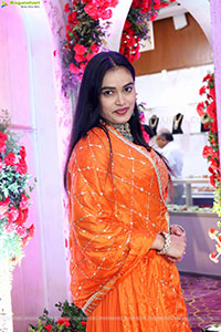 Manu Malleshwari stills in Orange Colour Designer Dress