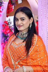 Manu Malleshwari stills in Orange Colour Designer Dress