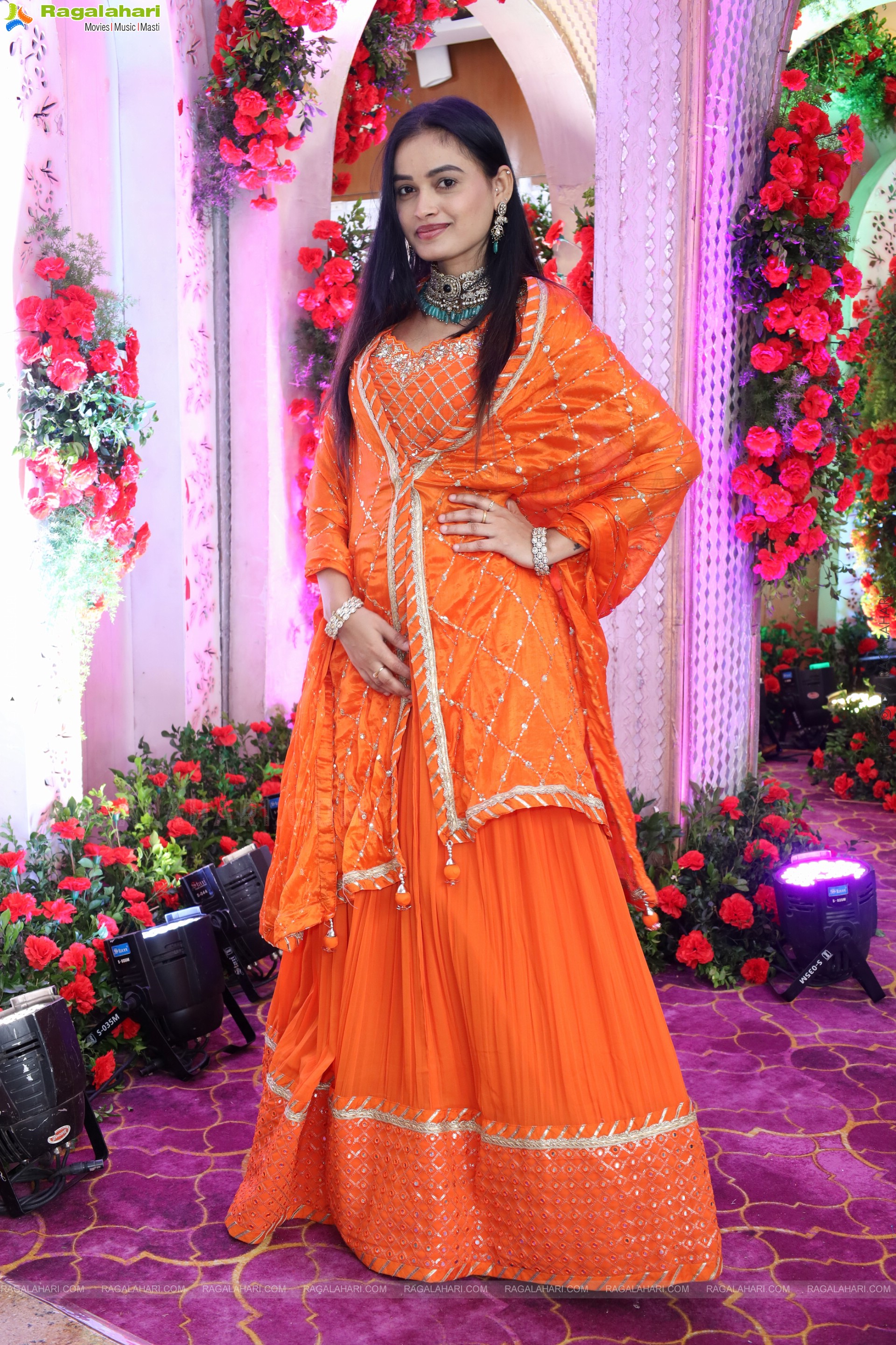 Manu Malleshwari stills in Orange Colour Designer Dress, HD Gallery