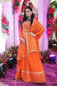 Manu Malleshwari stills in Orange Colour Designer Dress