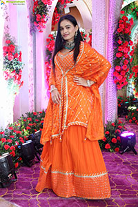 Manu Malleshwari stills in Orange Colour Designer Dress