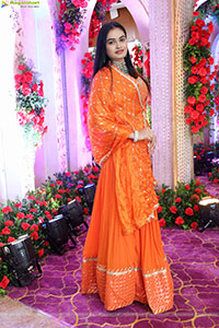 Manu Malleshwari stills in Orange Colour Designer Dress