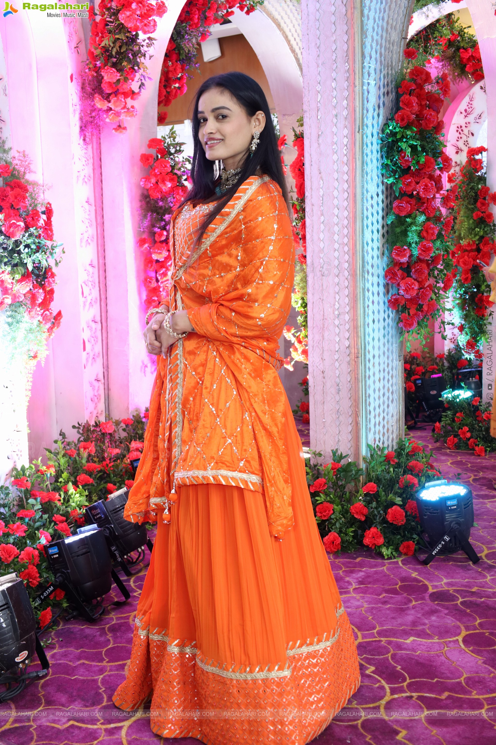 Manu Malleshwari stills in Orange Colour Designer Dress, HD Gallery