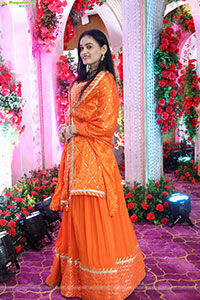 Manu Malleshwari stills in Orange Colour Designer Dress