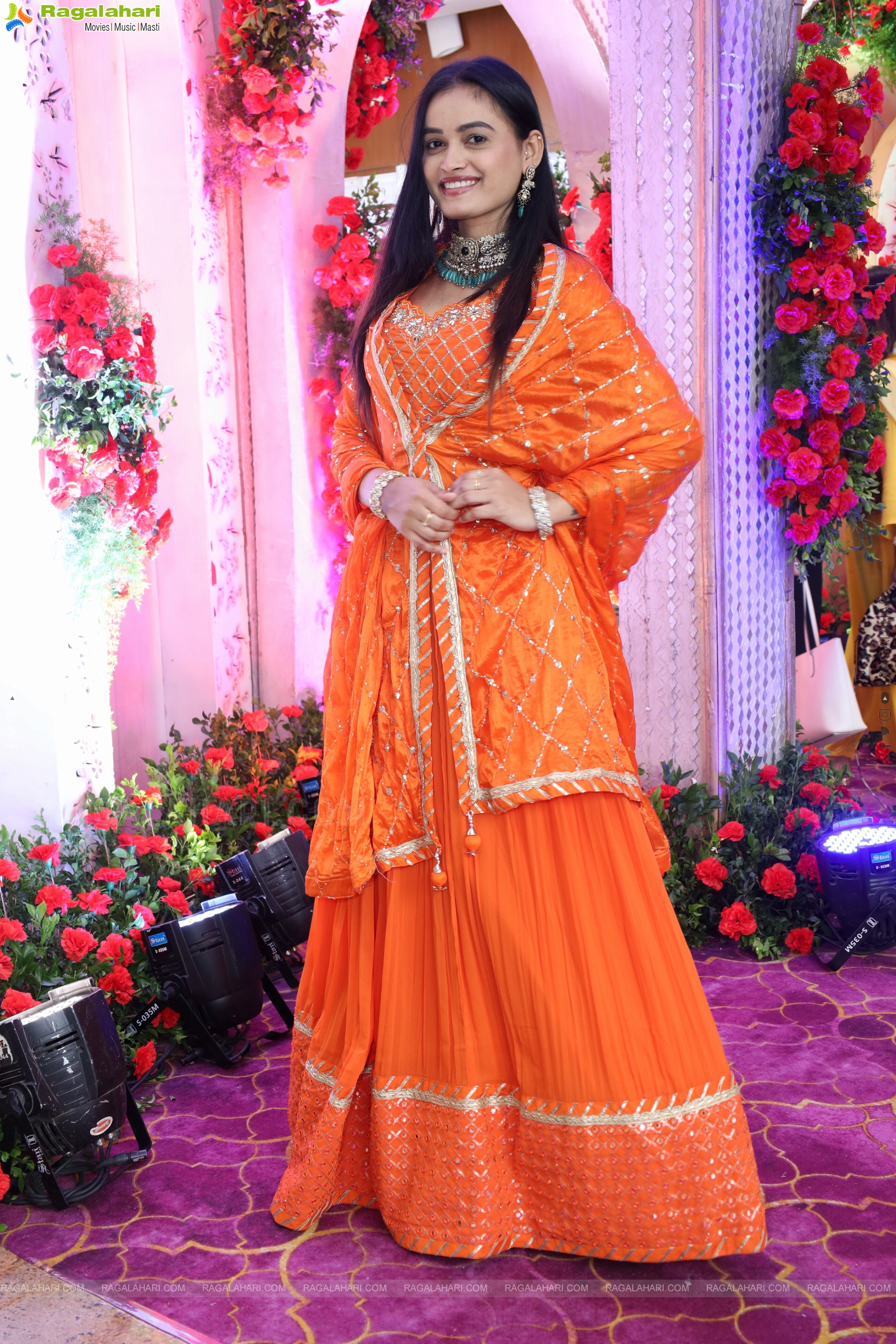 Manu Malleshwari stills in Orange Colour Designer Dress, HD Gallery