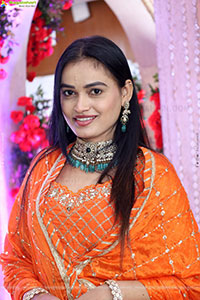 Manu Malleshwari stills in Orange Colour Designer Dress
