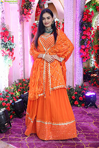 Manu Malleshwari stills in Orange Colour Designer Dress