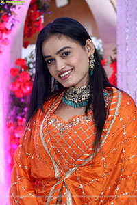 Manu Malleshwari stills in Orange Colour Designer Dress