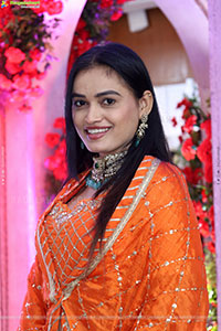 Manu Malleshwari stills in Orange Colour Designer Dress