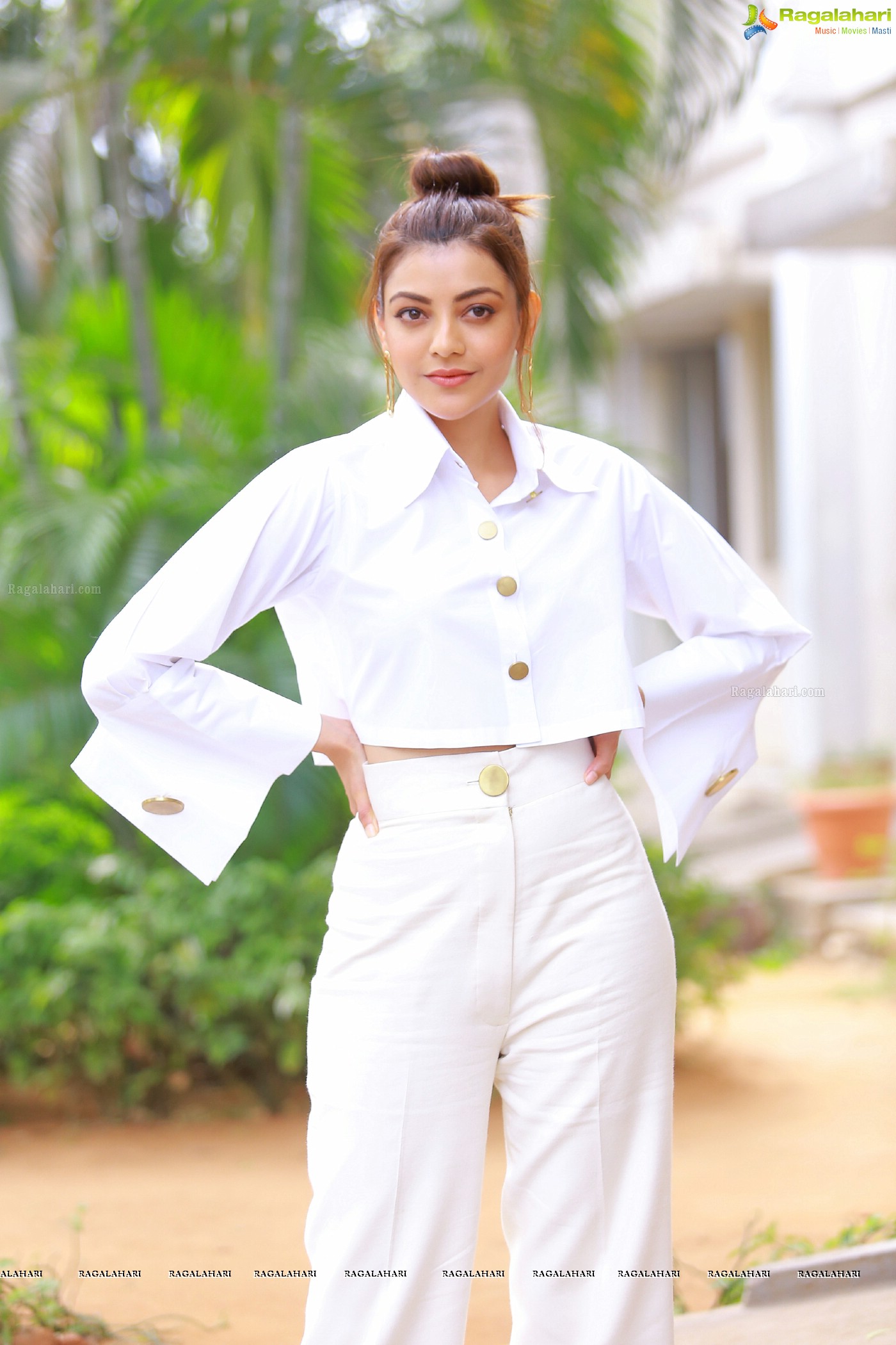 Kajal Aggarwal in White button-Up Crop Top at Kavacham Interview - Photo Gallery