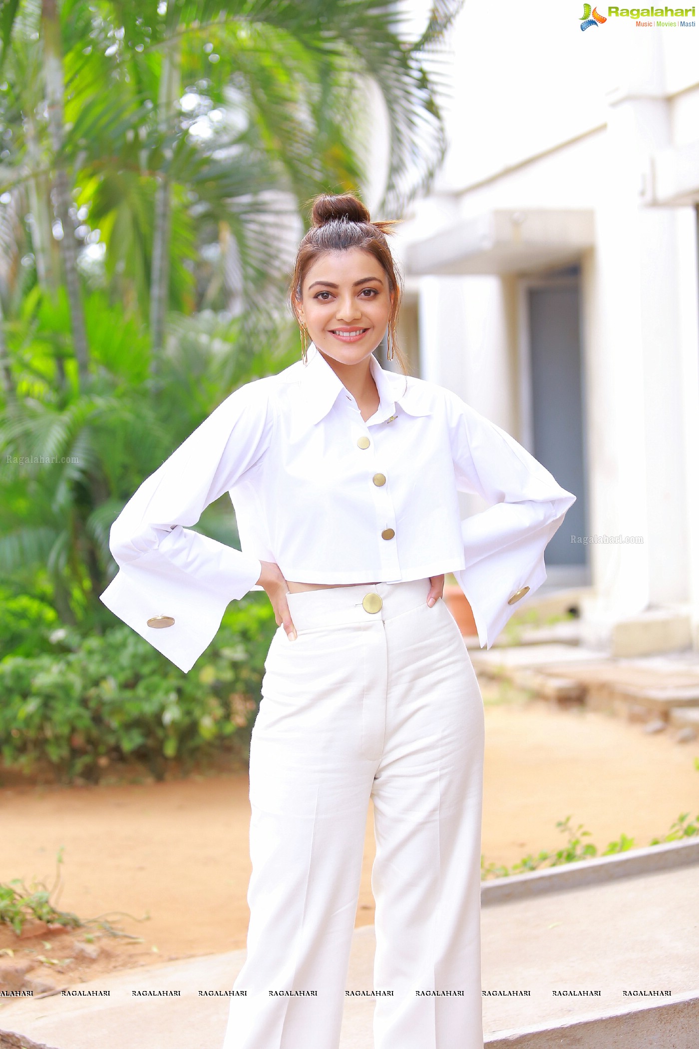 Kajal Aggarwal in White button-Up Crop Top at Kavacham Interview - Photo Gallery