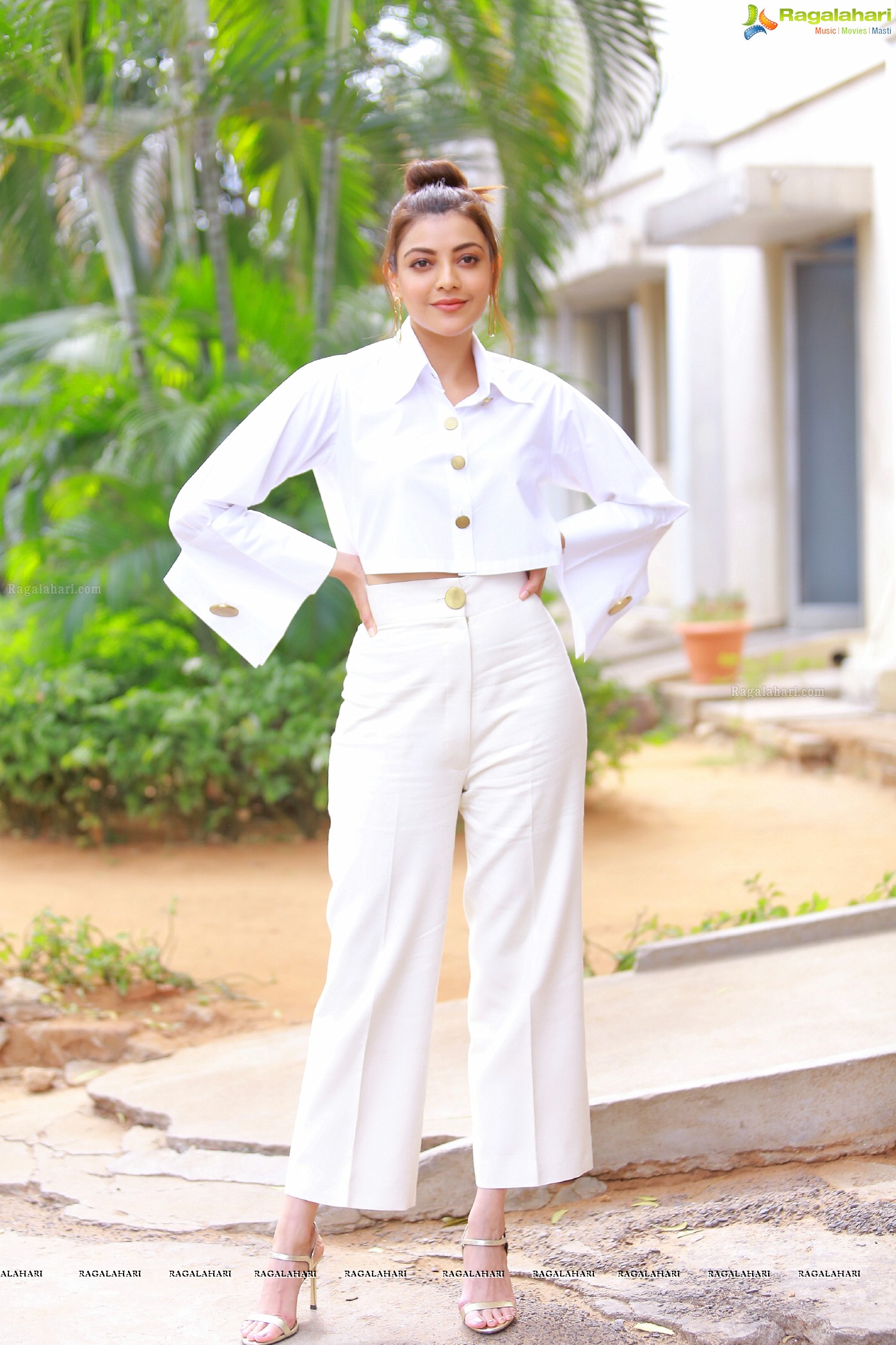 Kajal Aggarwal in White button-Up Crop Top at Kavacham Interview - Photo Gallery