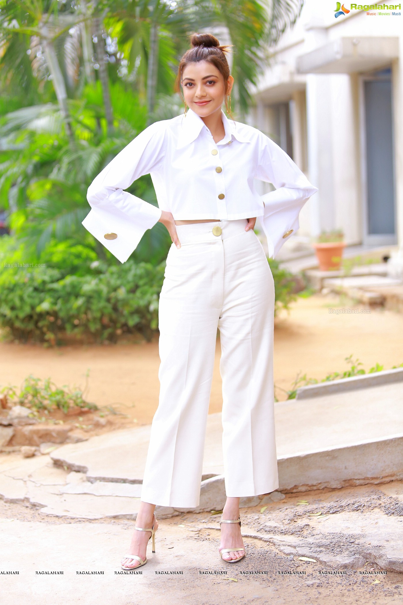 Kajal Aggarwal in White button-Up Crop Top at Kavacham Interview - Photo Gallery