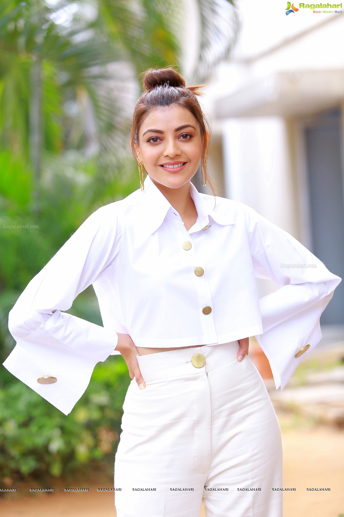 Kajal Aggarwal in White button-Up Crop Top at Kavacham Interview - Photo Gallery