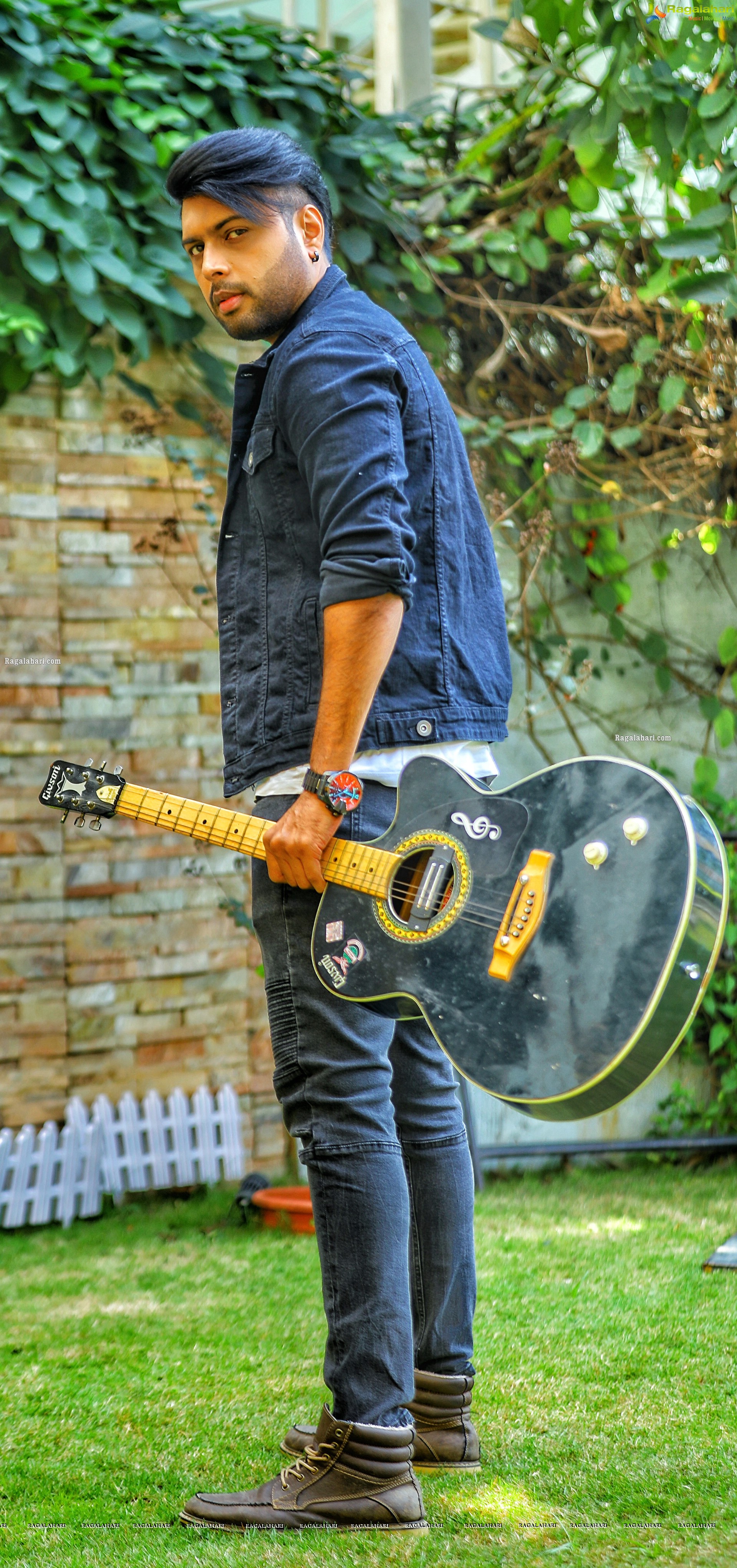 Bhushan Poses Holding Guitar - HD Gallery