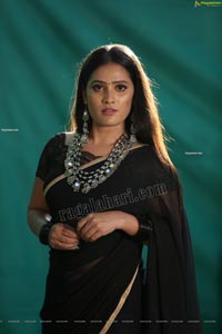 Anusha Parada in Black Saree With Gold Border