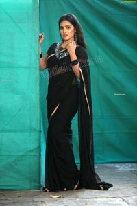 Anusha Parada in Black Saree With Gold Border