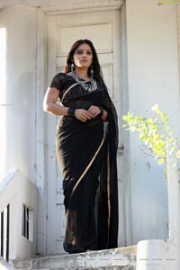 Anusha Parada in Black Saree With Gold Border