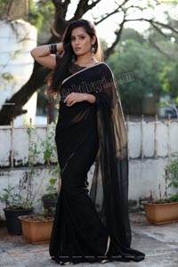 Anusha Parada in Black Saree With Gold Border