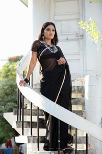 Anusha Parada in Black Saree With Gold Border