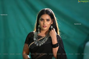 Anusha Parada in Black Saree With Gold Border