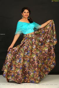 Indu in Sky Blue Frill Crop Top and Floral Lehenga