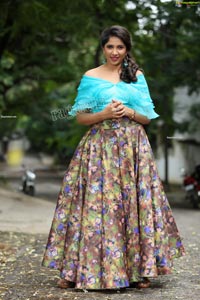 Indu in Sky Blue Frill Crop Top and Floral Lehenga