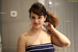 Saloni Aswani in Navy Blue Strapless Striped Swing Dress