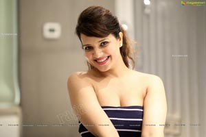 Saloni Aswani in Navy Blue Strapless Striped Swing Dress