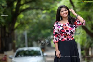 Shabeena Shaik in Blue Floral Top and Black Skirt