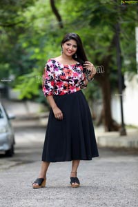 Shabeena Shaik in Blue Floral Top and Black Skirt