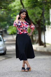 Shabeena Shaik in Blue Floral Top and Black Skirt