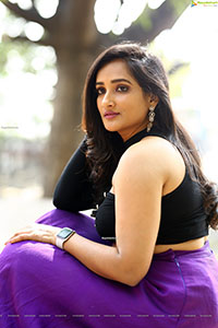 Anchor Madhu Krishnan in Purple Lehenga