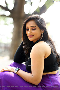 Anchor Madhu Krishnan in Purple Lehenga