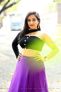 Anchor Madhu Krishnan in Purple Lehenga