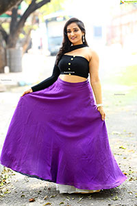 Anchor Madhu Krishnan in Purple Lehenga