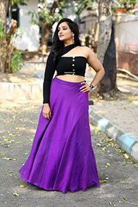 Anchor Madhu Krishnan in Purple Lehenga