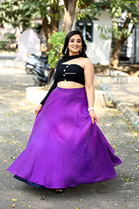 Anchor Madhu Krishnan in Purple Lehenga