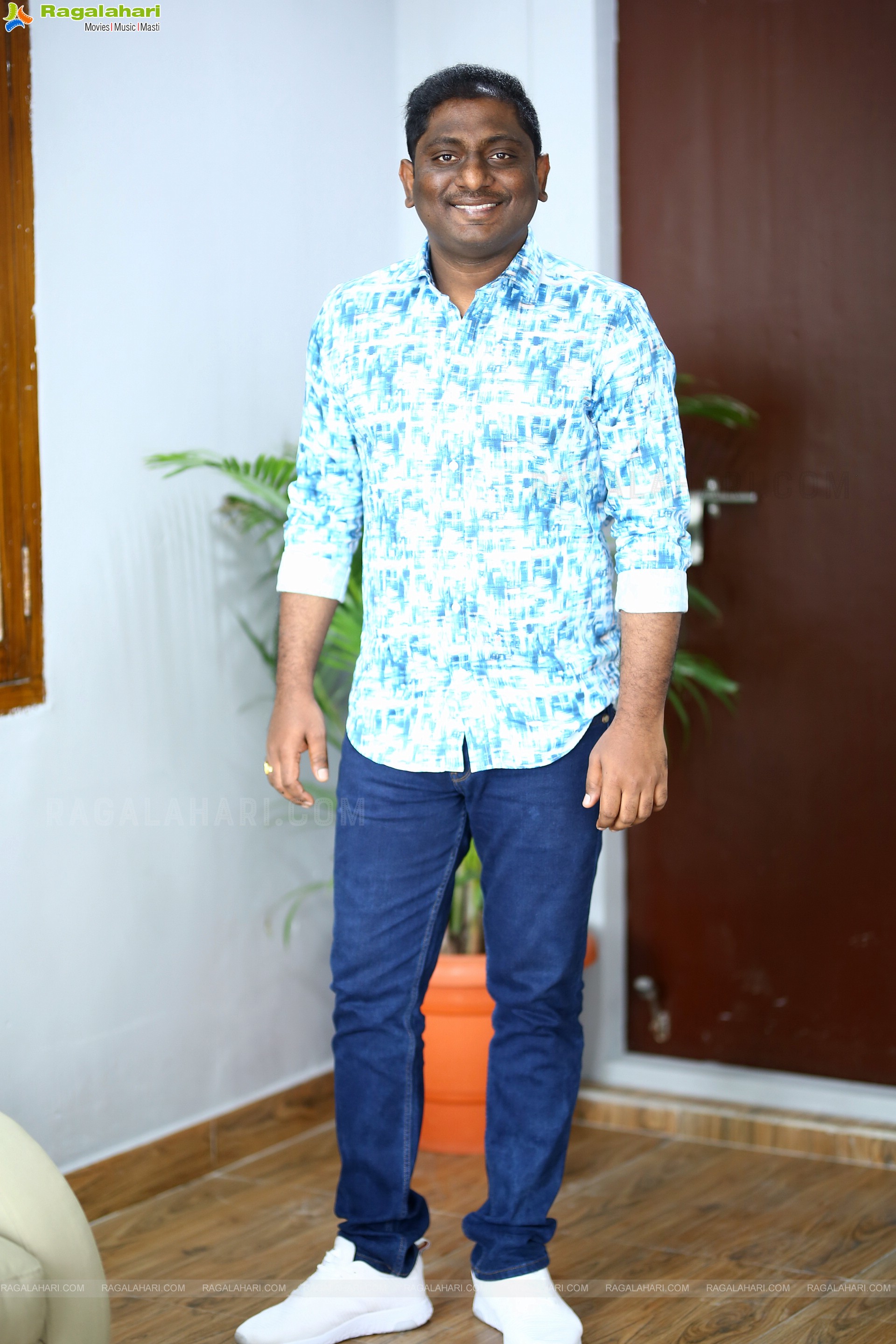 Screenwriter Prasanna Kumar Bezawada Stills at Dhamaka Movie Interview