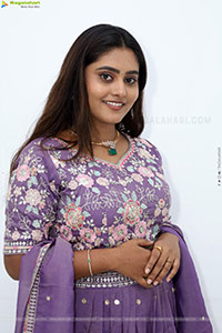 Bindhu Krishna stills in Purple Colour Lehenga Choli