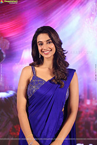 Meenakshi Chaudhary Beautiful stills in Blue Saree