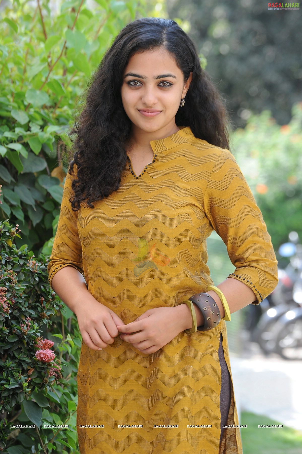 Nithya Menon at 180 Movie Press Meet, Hyderabad, Photo Gallery