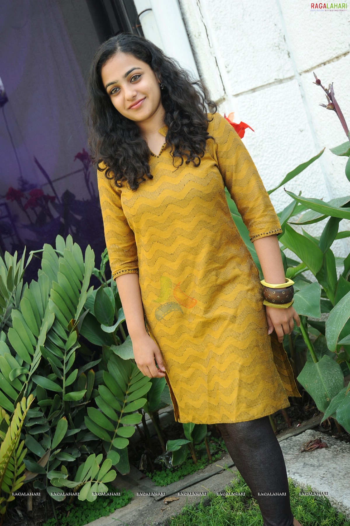 Nithya Menon at 180 Movie Press Meet, Hyderabad, Photo Gallery