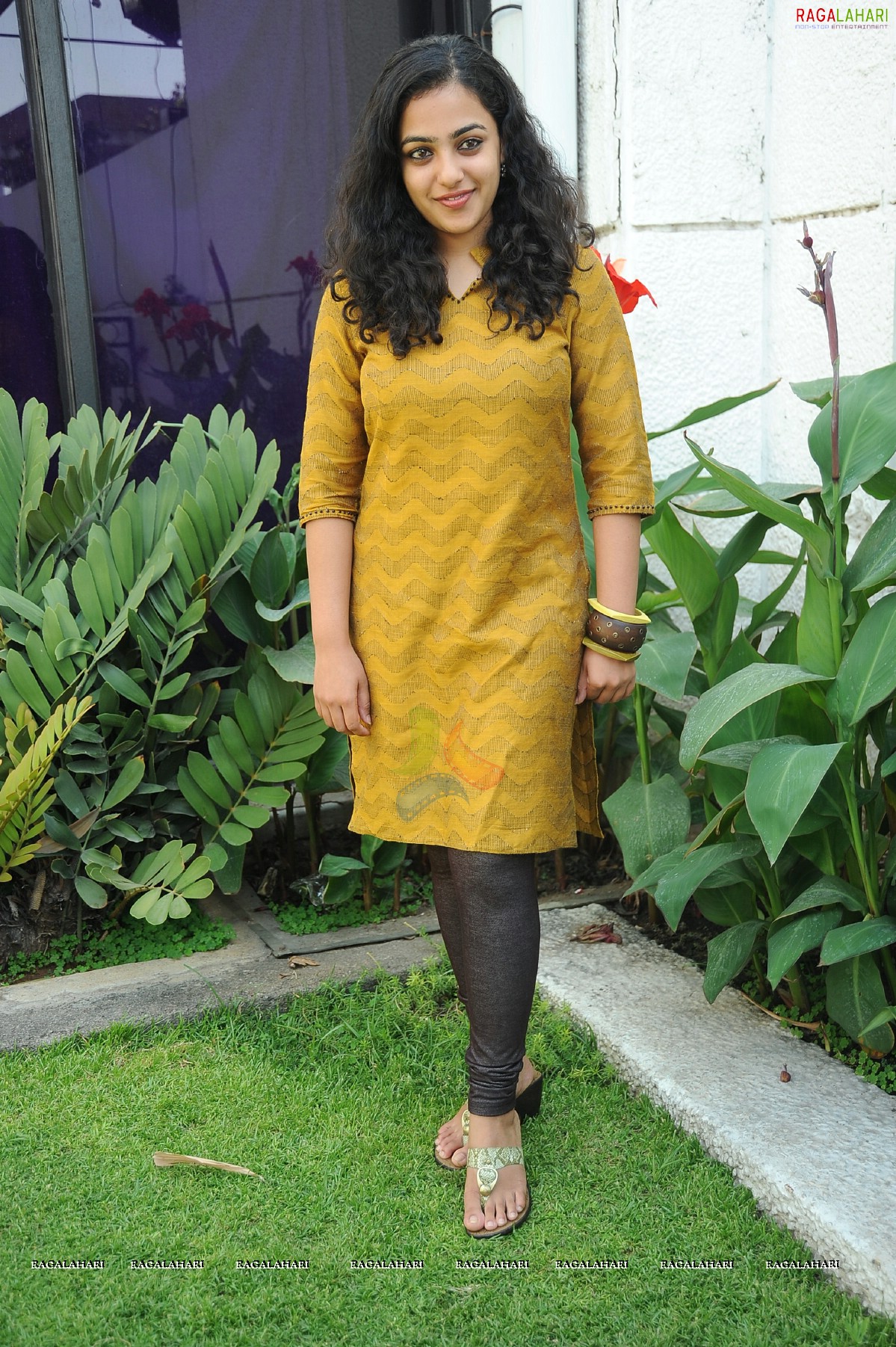 Nithya Menon at 180 Movie Press Meet, Hyderabad, Photo Gallery