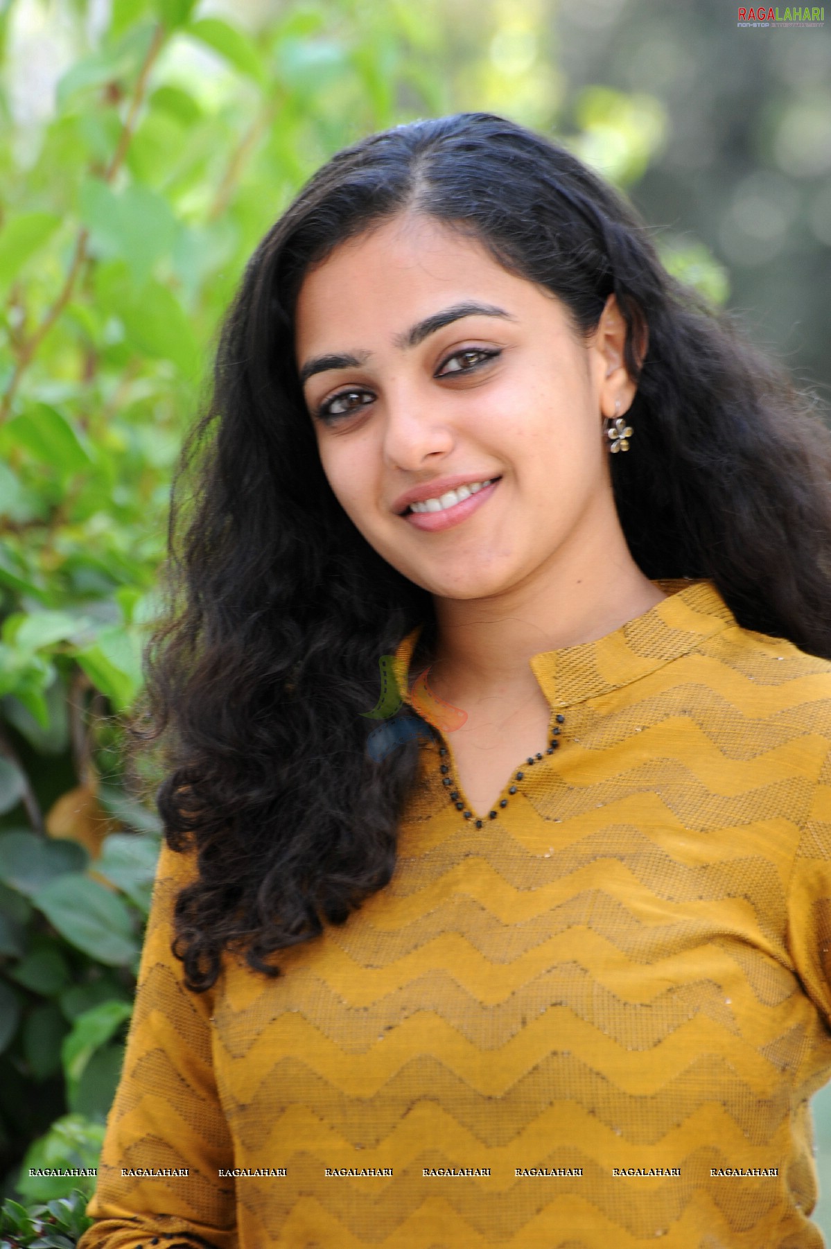 Nithya Menon at 180 Movie Press Meet, Hyderabad, Photo Gallery