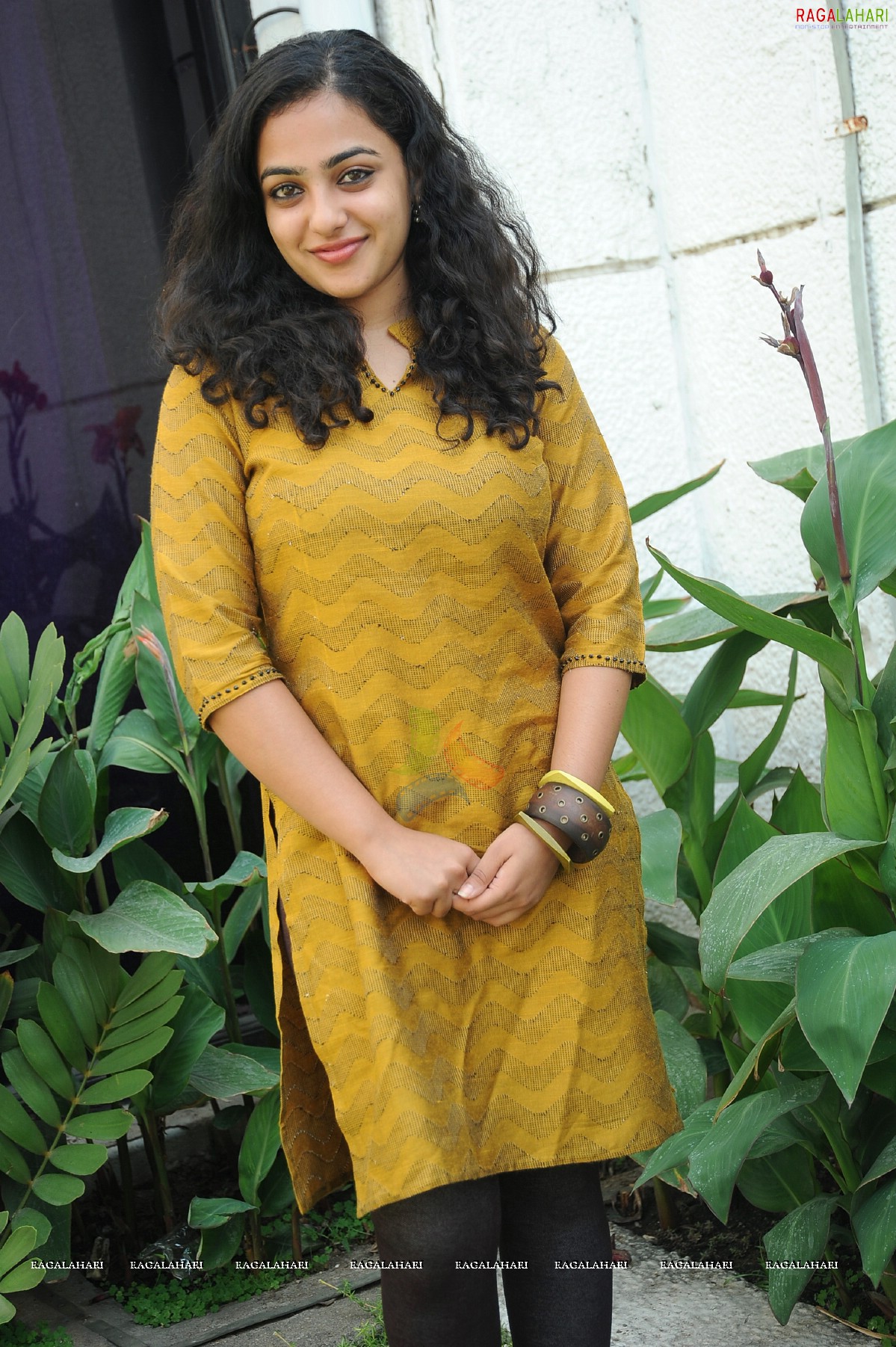 Nithya Menon at 180 Movie Press Meet, Hyderabad, Photo Gallery