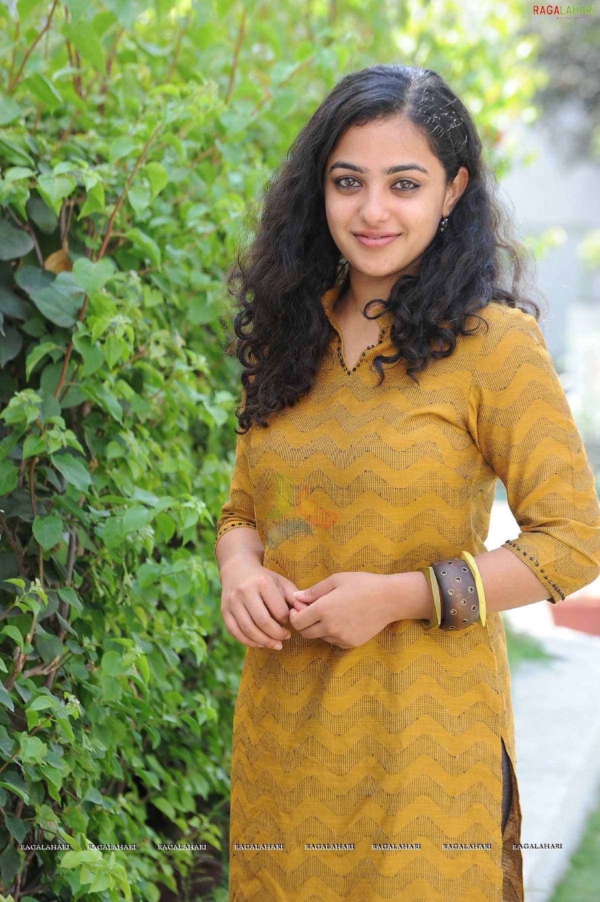 Nithya Menon at 180 Movie Press Meet, Hyderabad, Photo Gallery